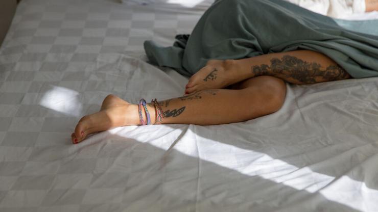 woman lying in bed
