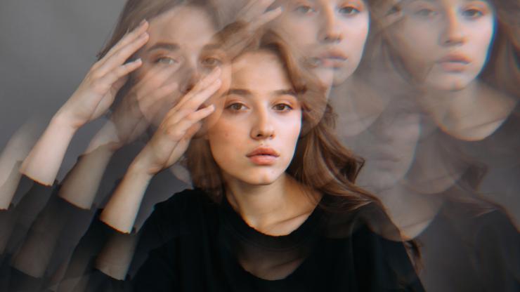 woman-touching-forehead