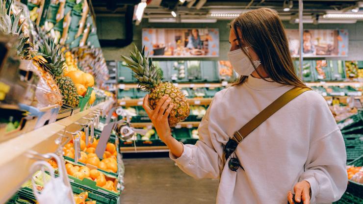 Woman Wearing Mask at Supermarket. Photo by Anna Shvets from Pexels.