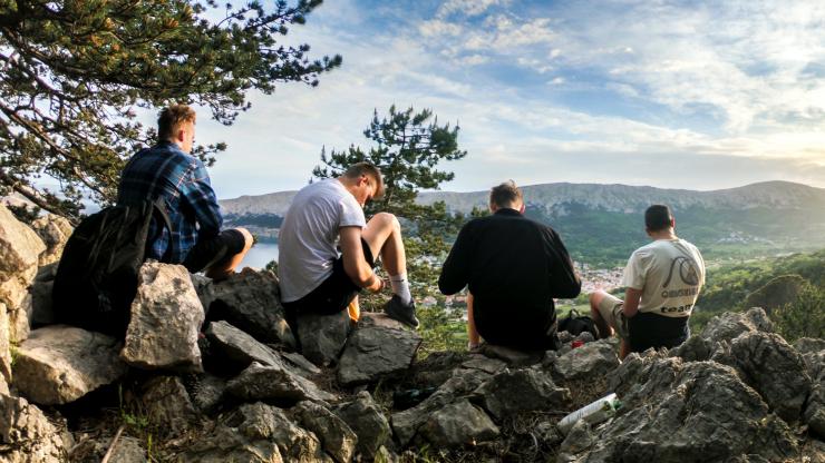 men talking on mountain