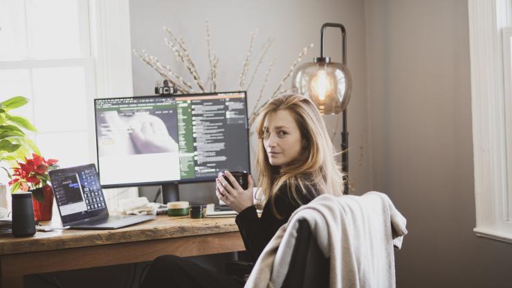 Kate McLeod sitting at her desk