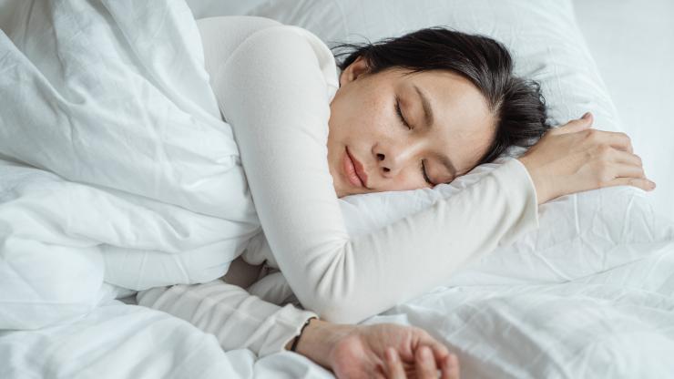 Woman asleep in bed